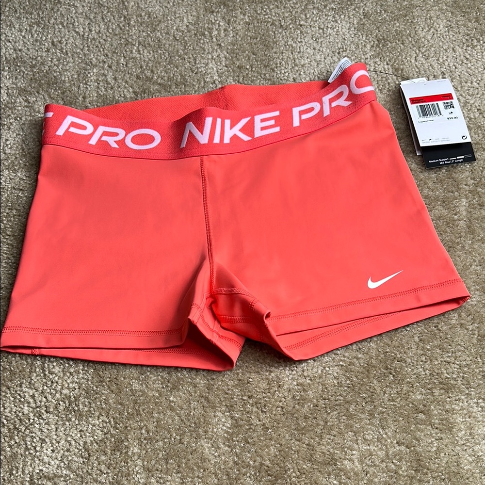 Nike Women's Bright Coral Athletic Shorts
